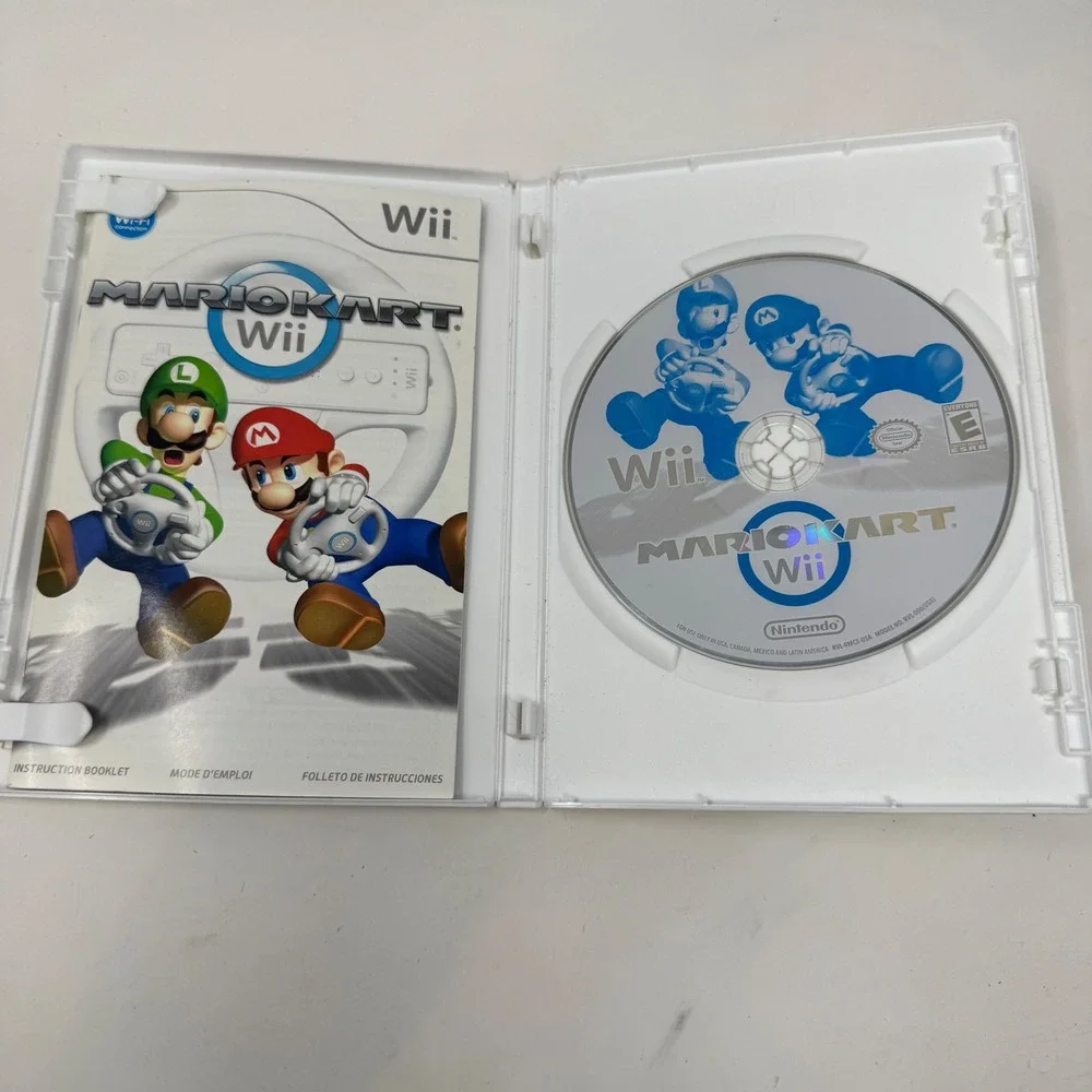 Mario Kart Wii Nintendo Wii Game with Red Hori Racing Wheel Accessory Bundle